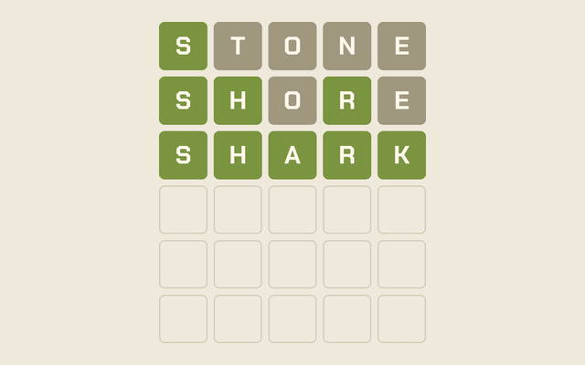A WordCrew board: STONE, then SHORE, then SHARK in five green tiles.